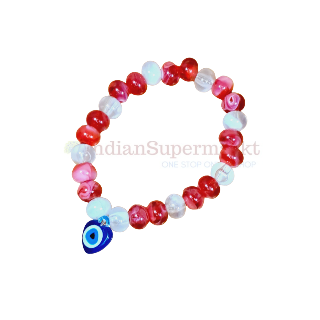 Beaded bracelet with a blue evil eye charm - indiansupermarkt