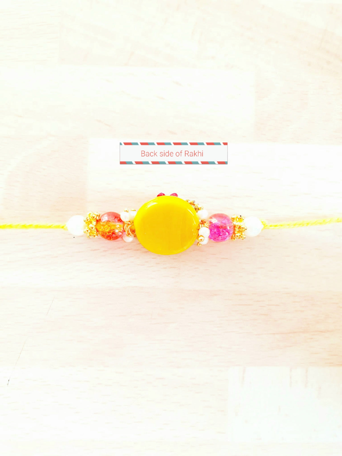 Yellow Rakhi - indiansupermarkt