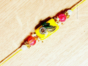 Yellow Rakhi - indiansupermarkt
